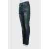 Jeans with patch pockets and tag