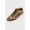 Mixed sneakers with gold hardware
