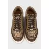 Mixed sneakers with gold hardware