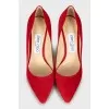 Red suede pumps