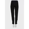 Elastic trousers with silver buttons