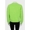 Green sweatshirt with text print