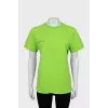 Green T-shirt with text print