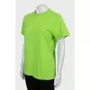 Green T-shirt with text print