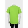 Green T-shirt with text print