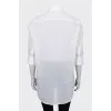 Loose-fitting blouse with lace