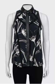 Sleeveless blouse with leather inserts