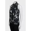 Sleeveless blouse with leather inserts