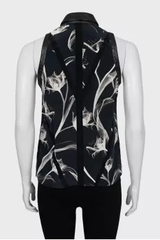 Sleeveless blouse with leather inserts