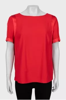 Red blouse with short sleeves