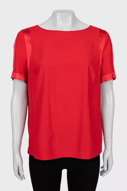 Red blouse with short sleeves