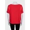 Red blouse with short sleeves