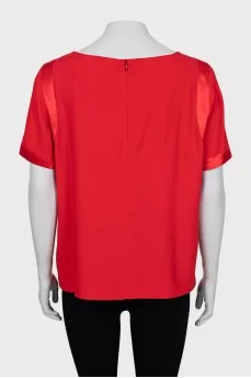 Red blouse with short sleeves
