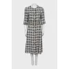 Tweed dress decorated with buttons
