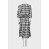 Tweed dress decorated with buttons