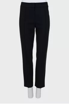 Black and white trousers with stitched creases