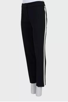 Black and white trousers with stitched creases
