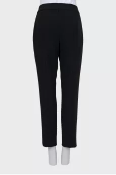 Black and white trousers with stitched creases