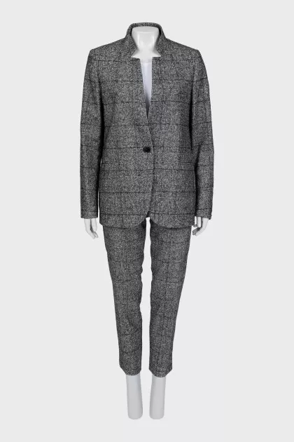 Suit with trousers in checkered print