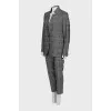 Suit with trousers in checkered print
