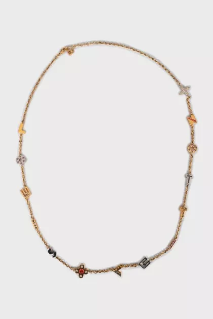 Gold pendant with rhinestones