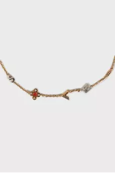 Gold pendant with rhinestones