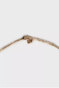 Gold pendant with rhinestones