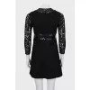 Black dress decorated with sequins