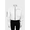 Bomber with sewn pocket