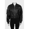 Black bomber jacket with sewn pocket