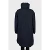 Dark blue down jacket with tag