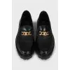 Leather loafers with gold detailing