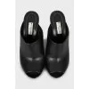 Leather sandals with decorated heels