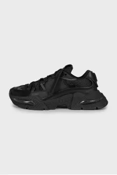 Black sneakers with signature logo
