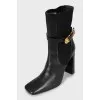 Leather ankle boots with figured heels