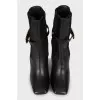 Leather ankle boots with figured heels