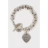 Silver bracelet with heart pendant