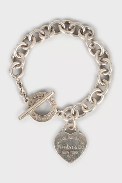 Silver bracelet with heart pendant