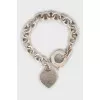 Silver bracelet with heart pendant