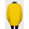 Reversible quilted jacket with tag