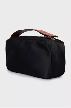 Textile clutch with leather handle