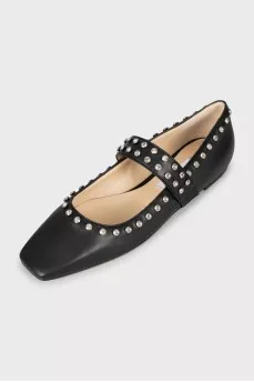 Leather ballet shoes decorated with rhinestones