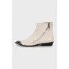 Suede boots with metal toe