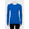 Blue jumper with logo on sleeve