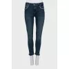 Blue jeans with decorative pockets