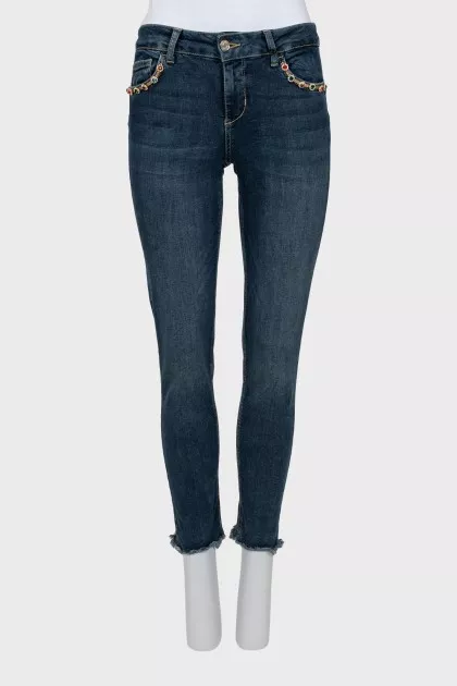 Blue jeans with decorative pockets