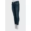 Blue jeans with decorative pockets