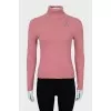 Knitted golf shirt decorated with rhinestones