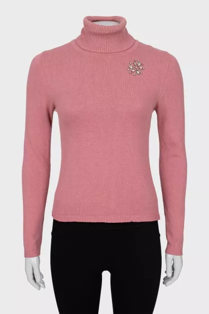 Knitted golf shirt decorated with rhinestones