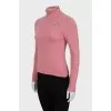 Knitted golf shirt decorated with rhinestones